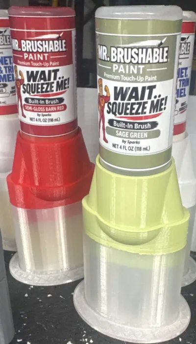 Red and green Mr. Brushable touch-up paint bottles with built-in brushes