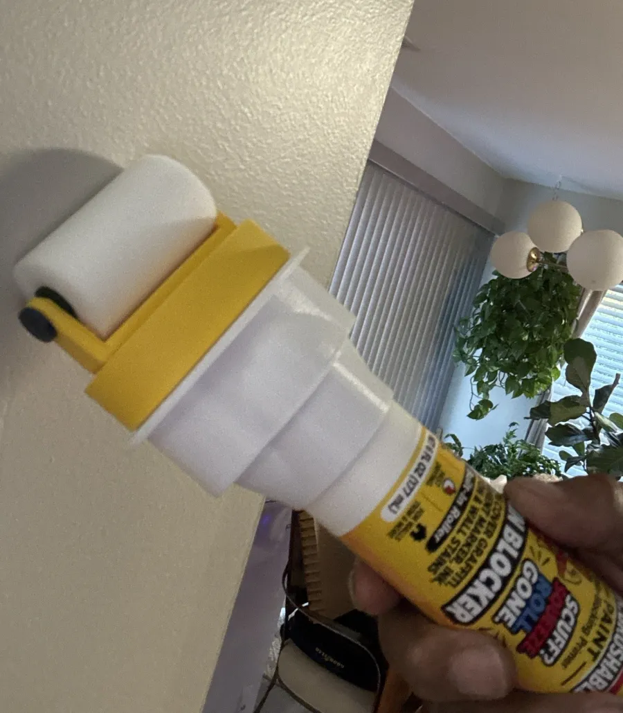 Rolling Mr. Brushable Stain Blocker onto a wall
